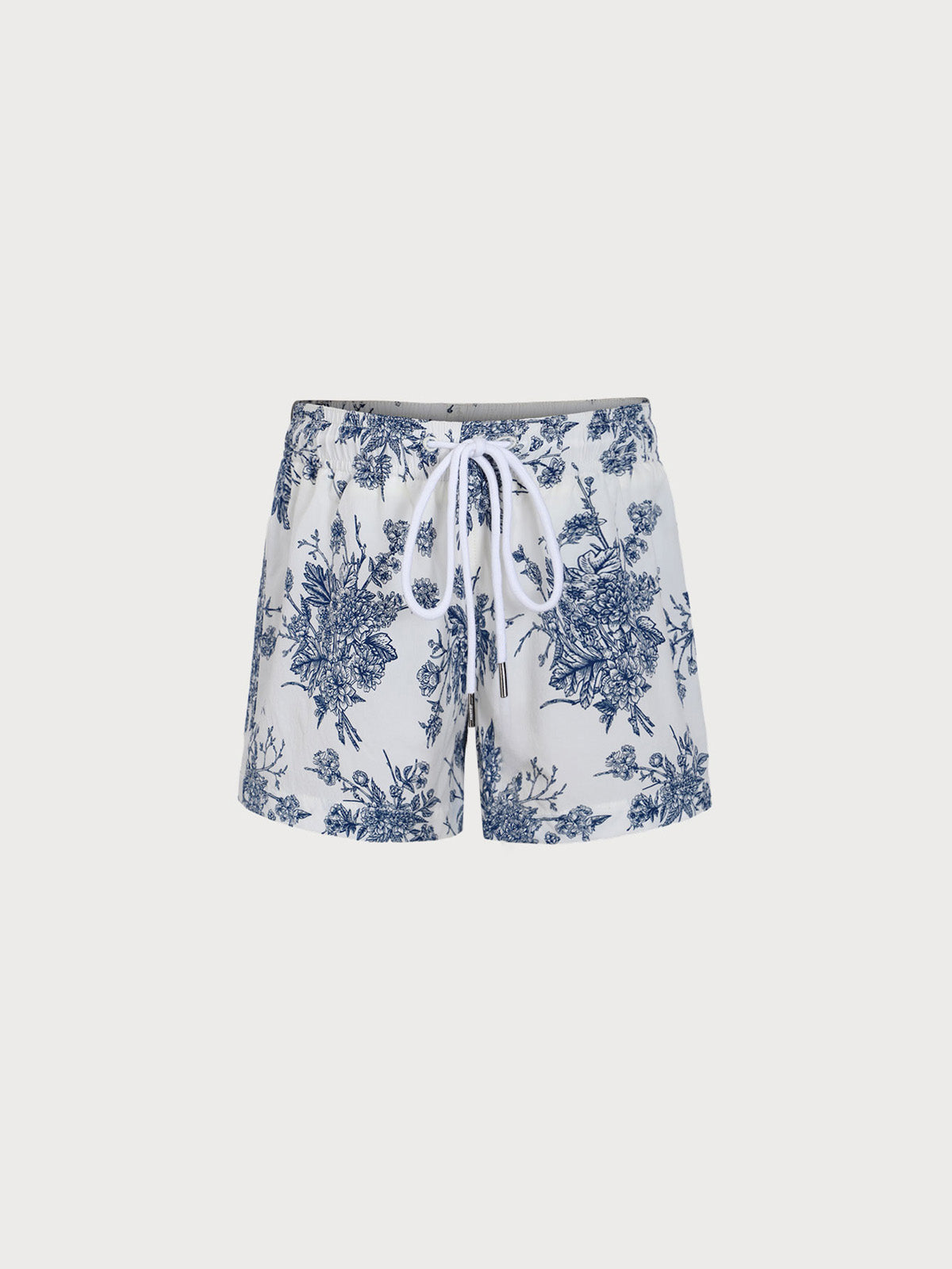 boys_-woven-nail-spandex-swim-shorts-sustainable-boys_clothing-whnh2k Boys' Blue Floral Swim Shorts - Image 1