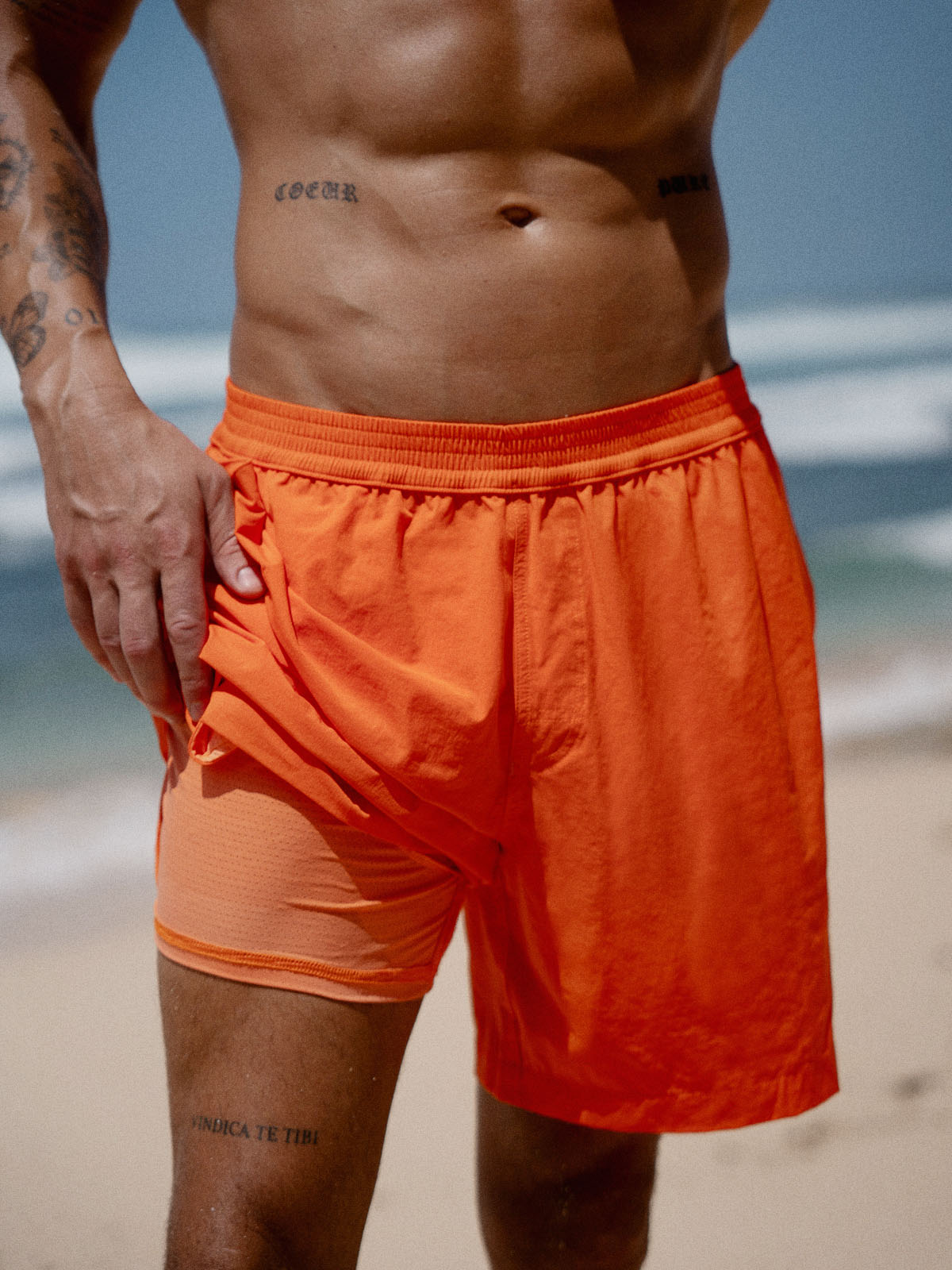 men_-s-woven-blend-swim-shorts-sustainable-men_s_beach_shorts-hjg5r1 Hapnix® - The Orange Men's 7" Swim Trunks - Image 1