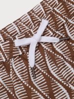 Brown Spiral 7" Crossover Swim Trunks - Image 4