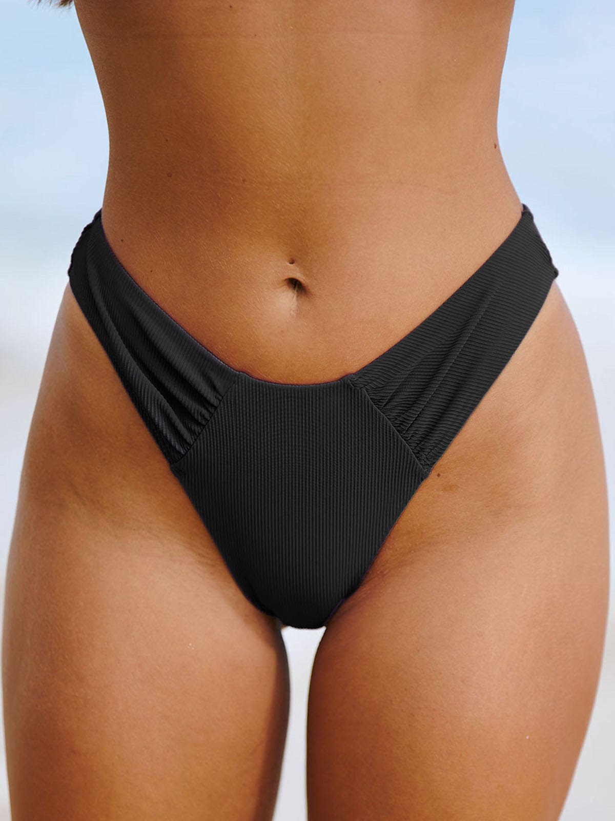 women-knitted-nylon-blended-bikini-bottoms-sustainable-bikinis-9bl4u1 Black Ruched Natural Waisted Bikini Bottom - Image 1