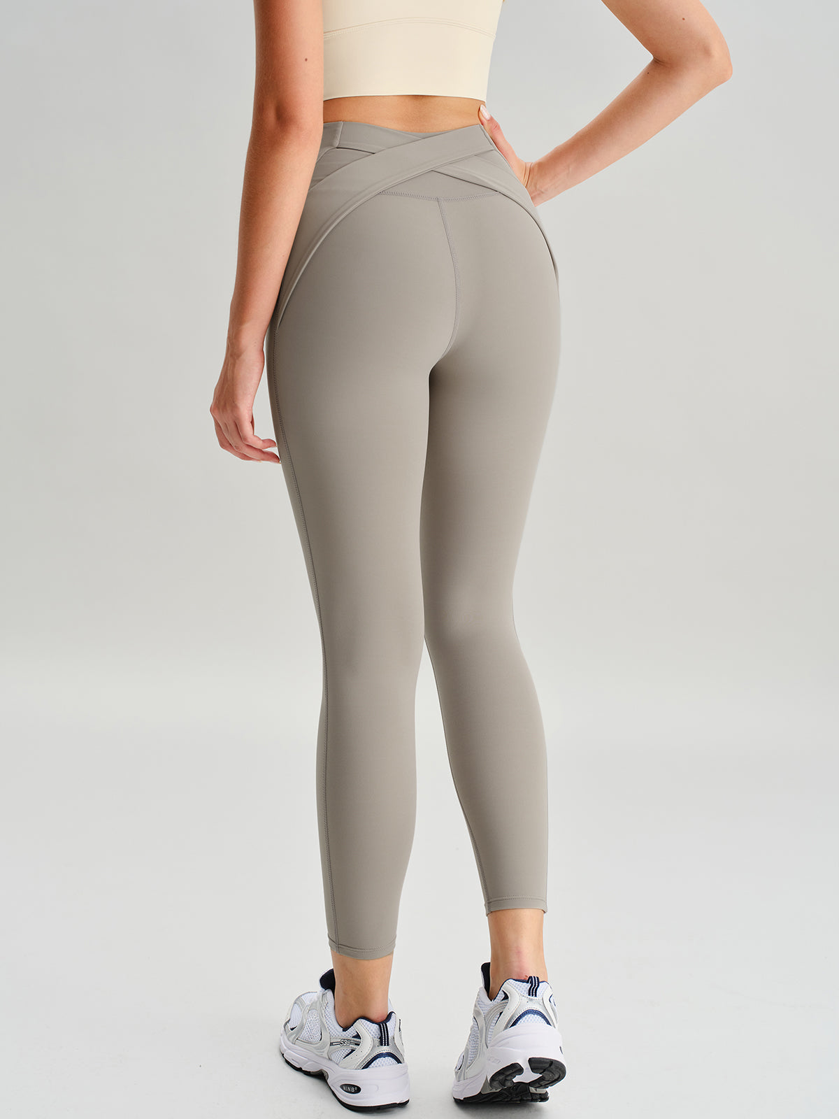 women-knitted-nylon-blended-yoga-leggings-sustainable-yoga_bottoms-oxzhr5 Khaki Cross Back Leggings 24” - Image 1