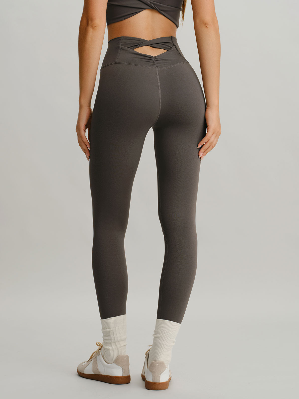women-knitted-nylon-yoga-leggings-sustainable-yoga_bottoms-sgpim2 Dark Coffee Cut Out Leggings 24" - Image 1