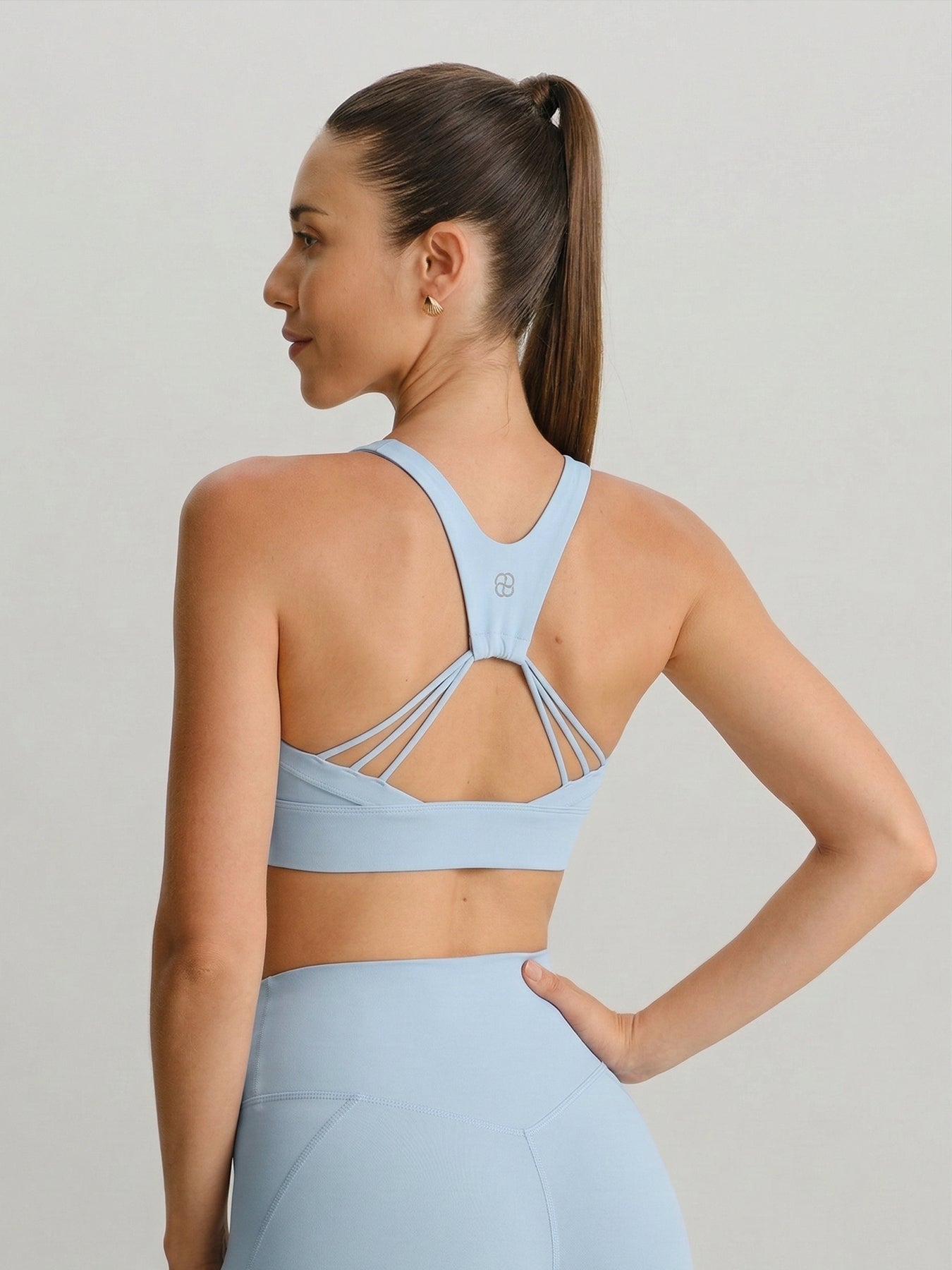 women_-s-knitted-nylon-sports-bra-sustainable-yoga_tops-uppks6 Light Blue U Neck Sports Bra - Light Support - Image 1