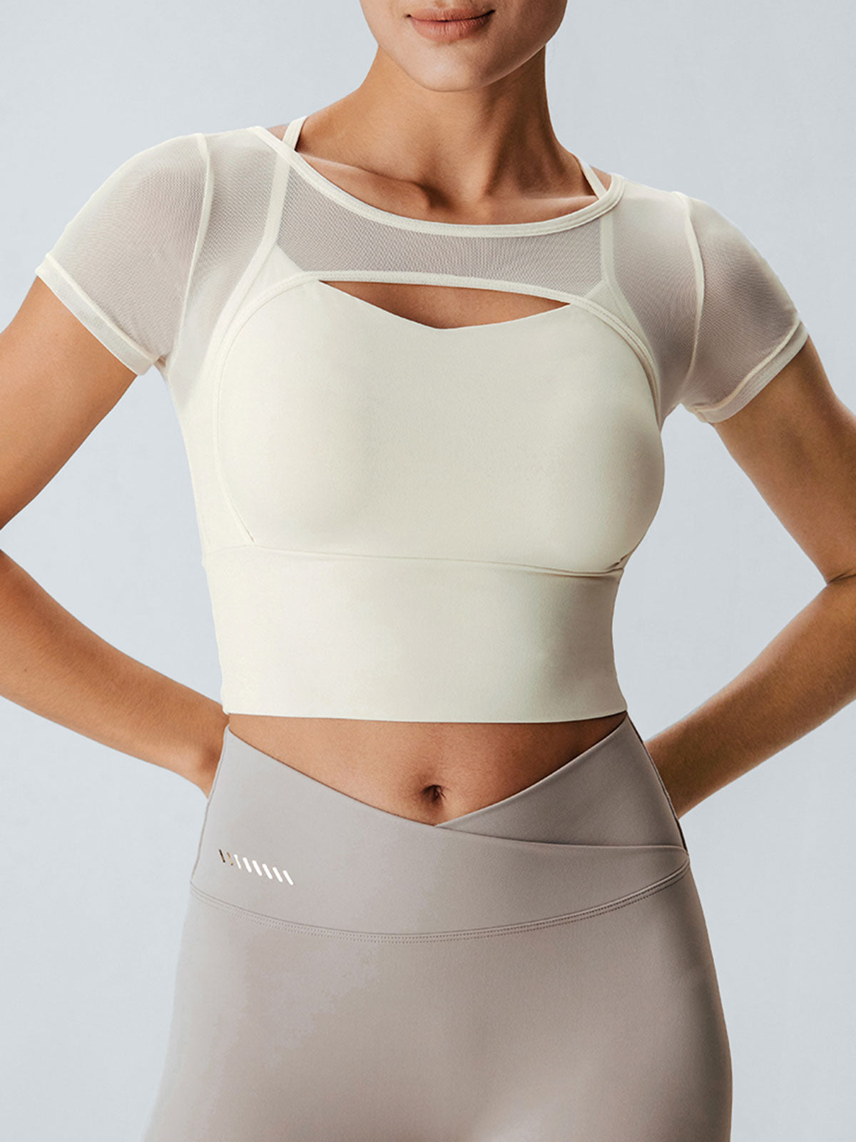women_-s-knitted-nylon-yoga-short-sleeve-tops-sustainable-yoga_tops-uojcrs Cut Out Short Sleeve Top--Light Support - Image 1
