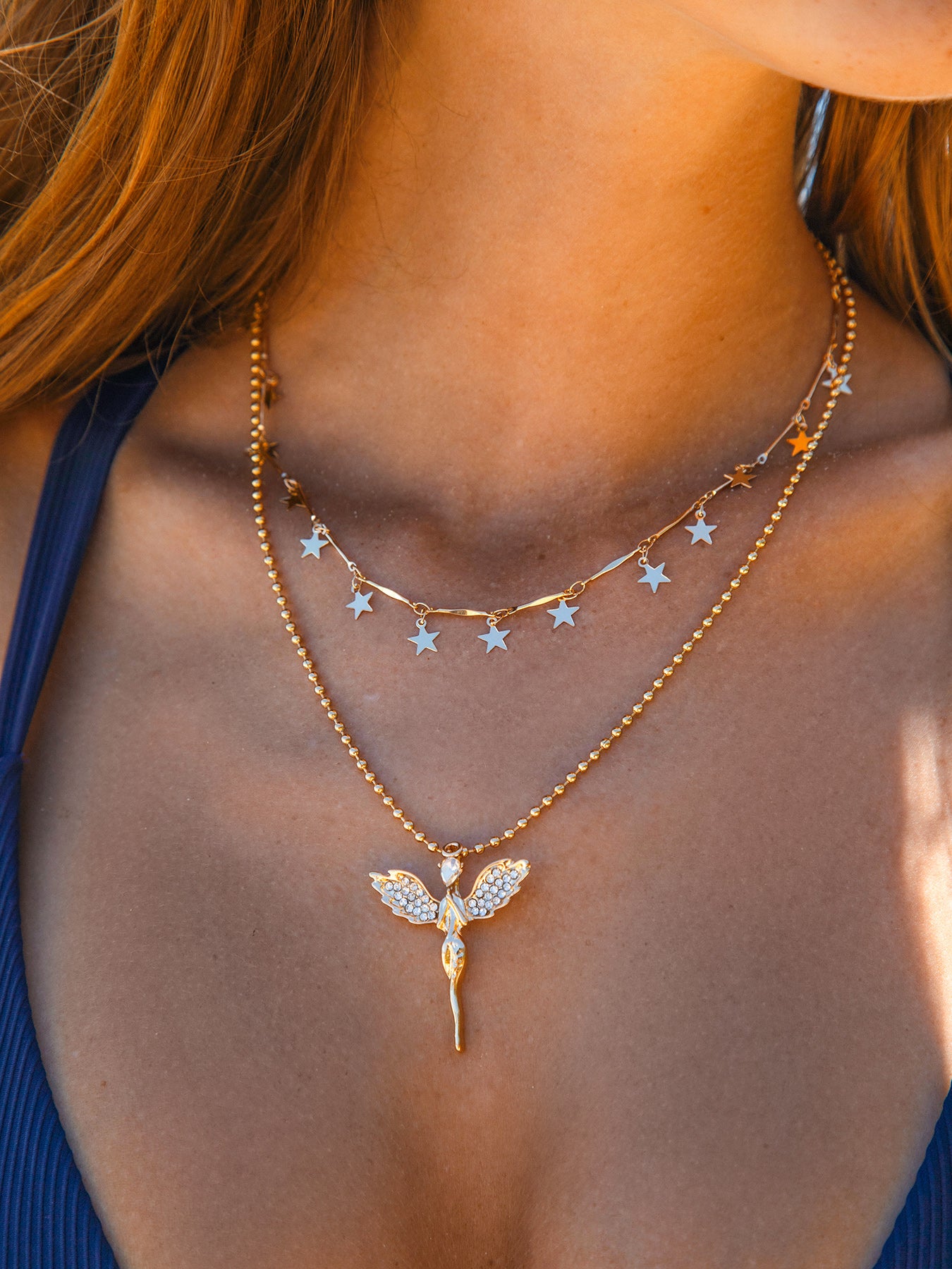 women_s-alloy-angel-pendant-necklace-sustainable-necklaces-pmfqha Gold Alloy Angel Pendant Necklace - Image 1