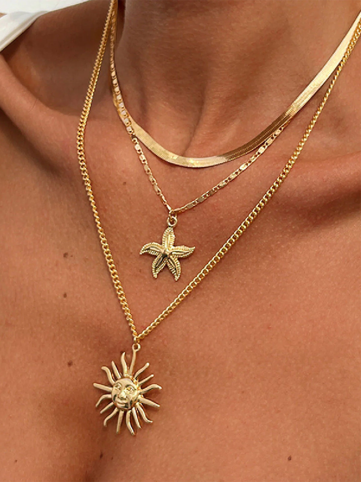women_s-alloy-sun-necklace-sustainable-necklaces-a1ayuu Layered Golden Sun Necklace - Image 1