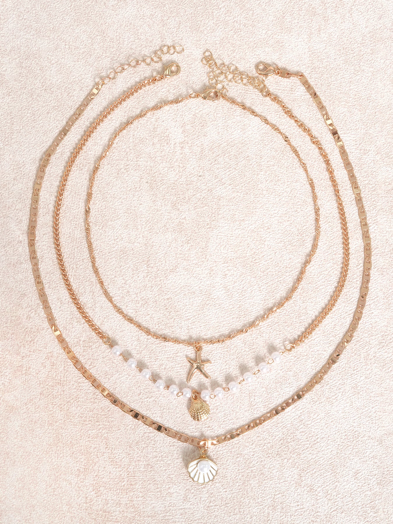 women_s-copper-shell-necklace-gold-sustainable-necklaces-rvhs2b Gold Coastal Layered Necklace Set - Image 1