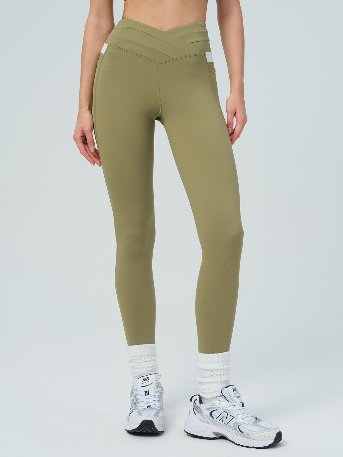 women_s-knitted-nylon-leggings-sustainable-yoga_bottoms-ltudnb Green V-Cut High Waisted Pockets Leggings 26" - Image 1