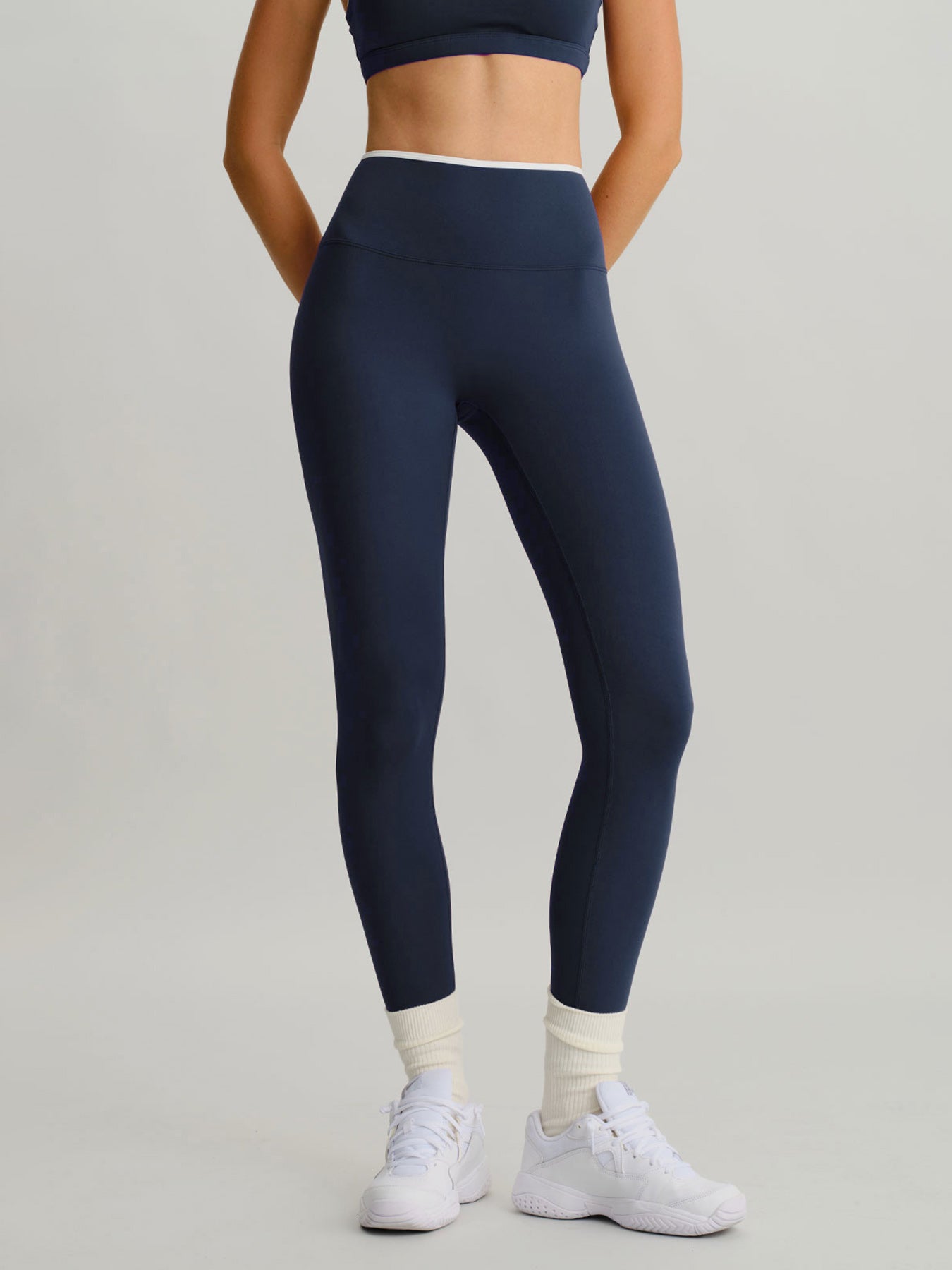 women_s-knitted-nylon-sports-leggings-sustainable-yoga_bottoms-nclano Navy High-Waisted Contrast Trim Leggings 25" - Image 1