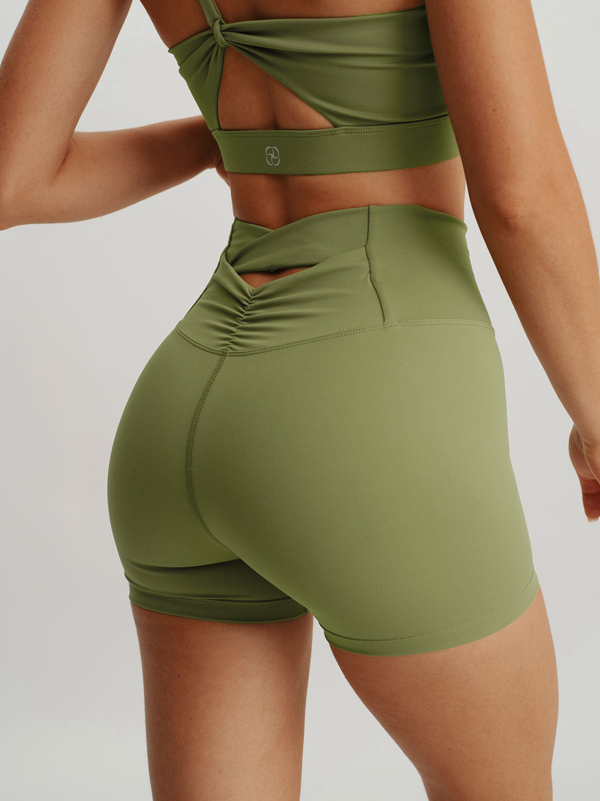 women_s-knitted-nylon-sports-shorts-green-sustainable-yoga_bottoms-wgsqyr Green Cut Out Shorts 3" - Image 1