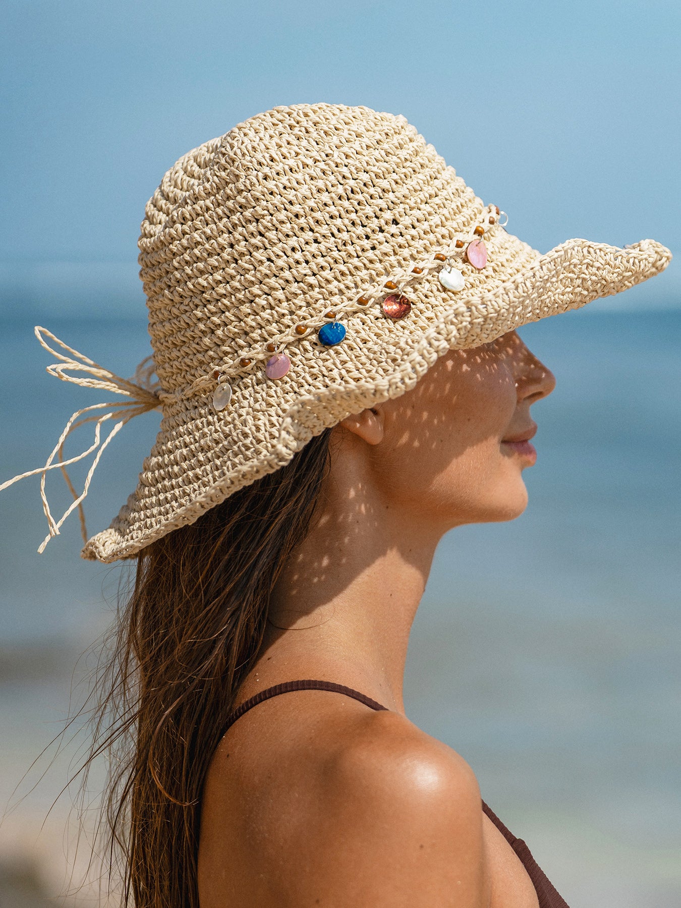 women_s-knitted-paper-hat-sustainable-hats-hduciv Off White Boho Shell Decor Sun Hat - Image 1