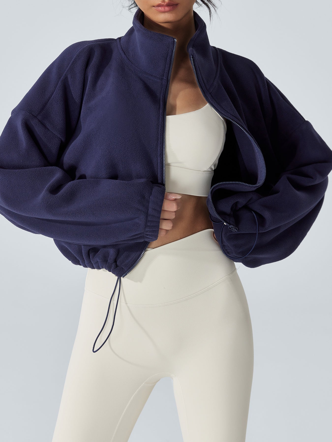 women_s-knitted-polyester-yoga-jacket-navy-sustainable-yoga_tops-xf3bcw Navy Cropped Fleece Zip-Up Sports Jacket - Image 1