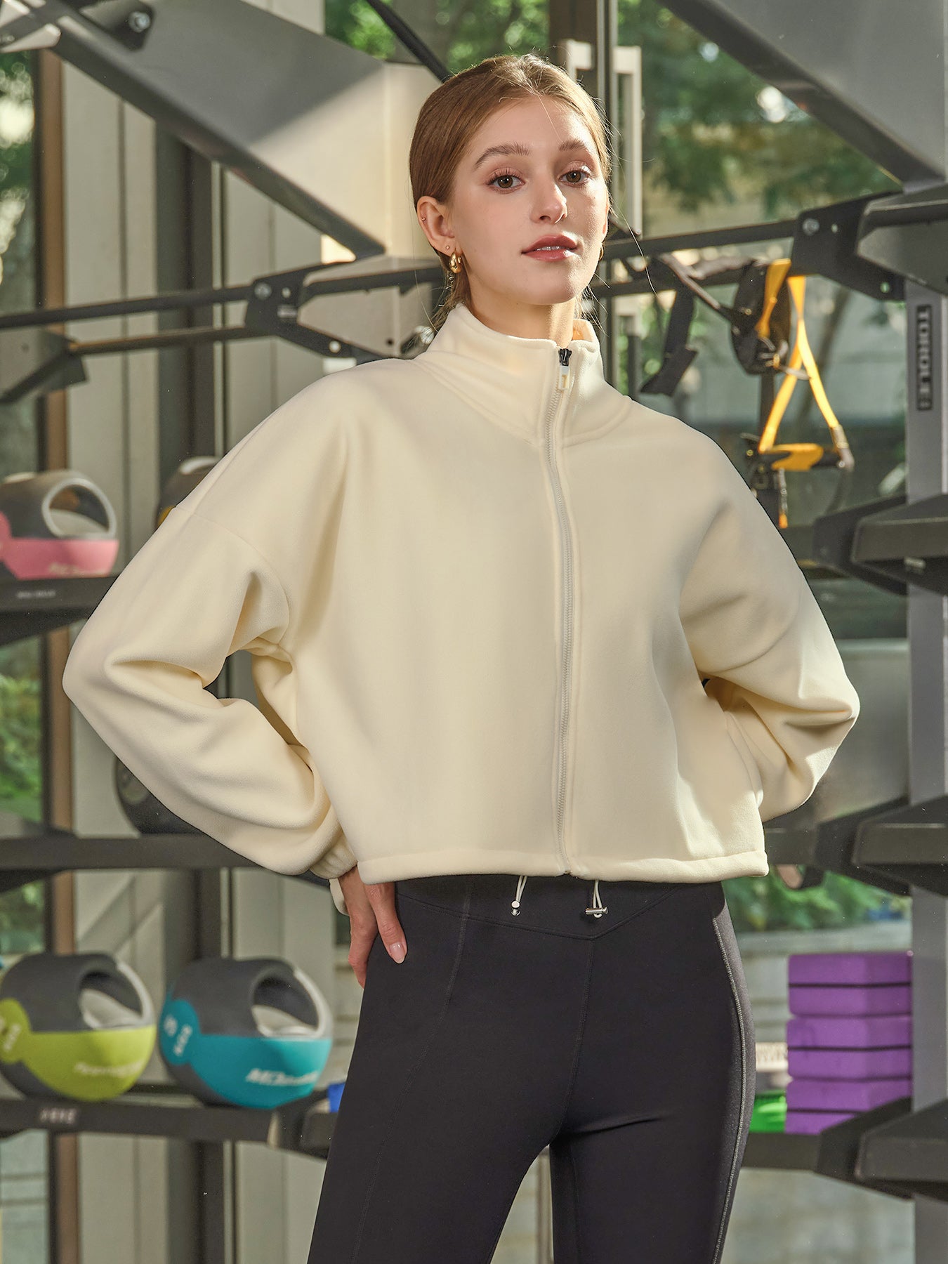 women_s-knitted-polyester-yoga-jacket-sustainable-yoga_tops-ei0thp Cream Cropped Fleece Zip-Up Sports Jacket - Image 1